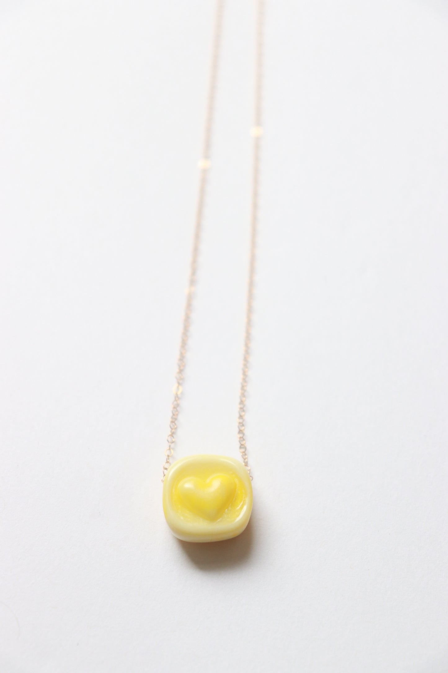 Yellow Glass Heart Stamp Necklace